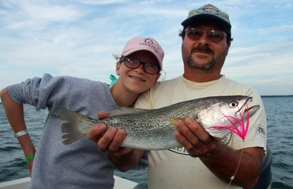 Capt. Tom Federicdo and daughter, Natalie, show off a fine-looking Peconic Bay summer-run weakfish.