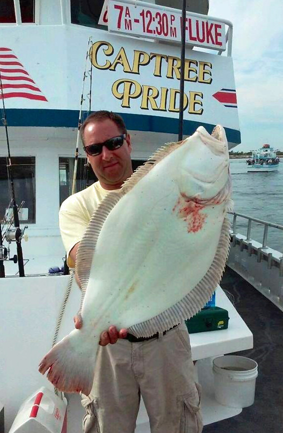 QUALITY SEA BASS, FLUKE AND STRIPERS, PLUS SURF SCUP JULY 18, 2014