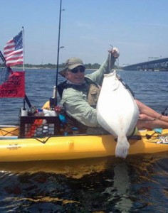 Rick Sanders drilled this big doormat, just shy of 14 pounds, from his kayak in the vicinity of the Marine Parkway Bridge on July 3. Just two days earlier, Sanders caught a 10-pounder - his first double-digit fluke! Photo courtesy of Elias Viasberg.